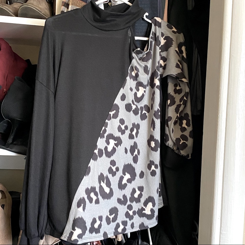 Size Small open shoulder long sleeved BiBi shirt